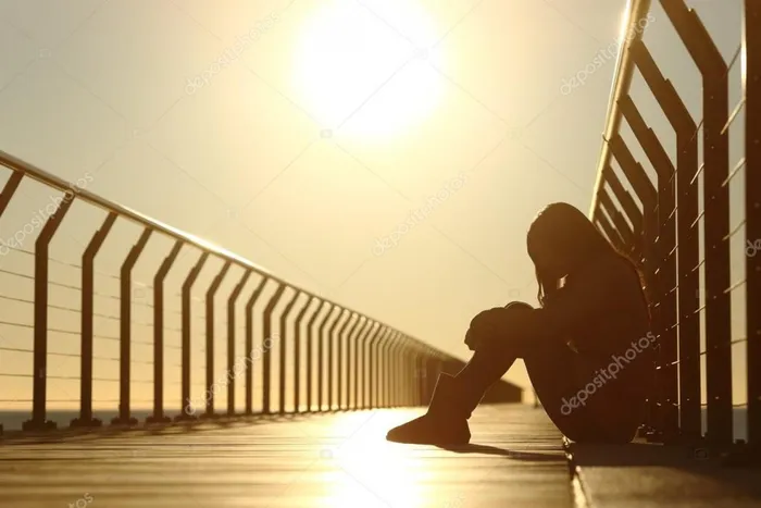 depositphotos_69558057-stock-photo-sad-teenager-girl-depressed-sitting